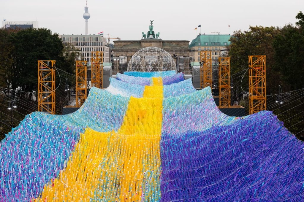 Gigantic Art Installation Of 120,000 Colourful Ribbons Streamed The Brandenburg Gate In Commemoration Of The Fall Of The Berlin Wall
